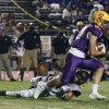 Lemoore's Koy Davis runs for a short fourth-quarter game Friday night in Tiger Stadium.